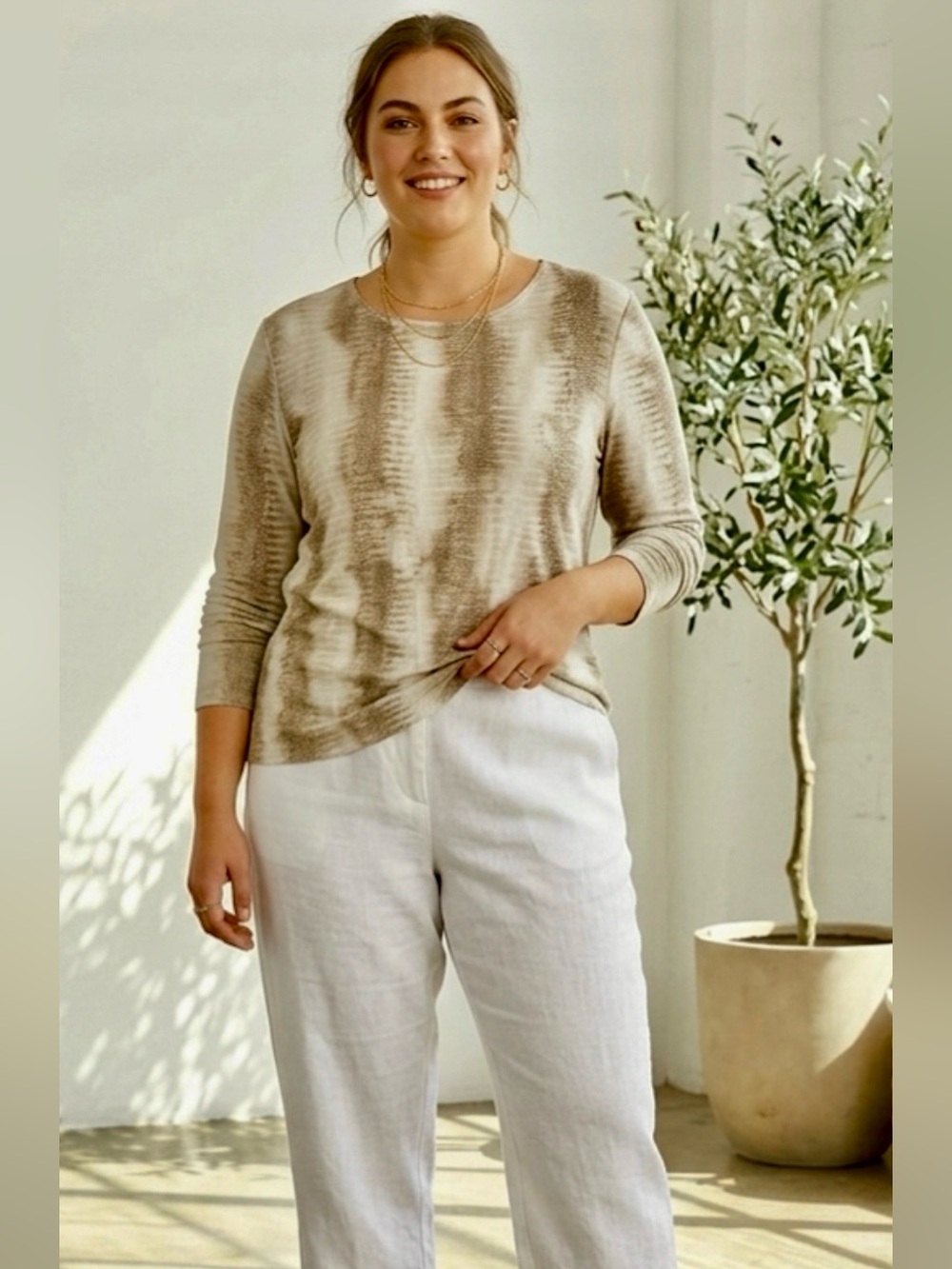 Chico’s, NWT, snakeskin print long-sleeve top. Size 3 (14-16). P2P: 22”.